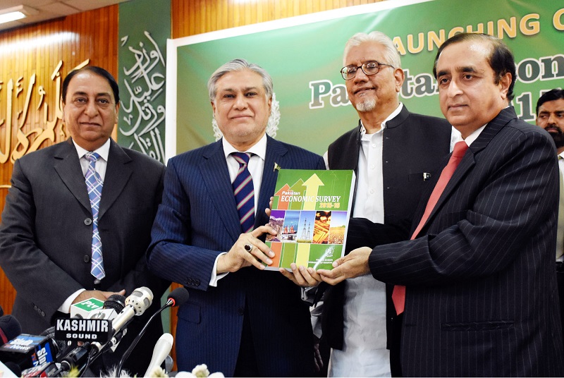 Finance Minister Senator Mohammad Ishaq Dar displays copy of Economic Survey 2015-16 to the media at the launching ceremony held in Islamabad on June 2, 2016. Parliamentary Secretary (Finance), Rana Mohammad Afzal, Secretary Finance, Dr. Waqar Masood Khan, Economic Advisor, Syed Ejaz Wasti, others are also present.