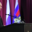 putin-at-meeting-580×340