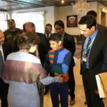 Pakistan reunites an Afghan Child with his family