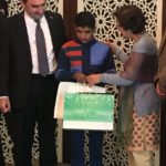 Pakistan reunites an Afghan Child with his family