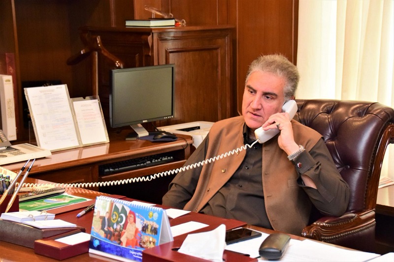 Muslim Ummah - The Foreign Minister Shah Mahmood Qureshi had a telephone conversation with the Organization of Islamic Cooperation (OIC) Secretary General Dr. Yousef A. Al-Othaimeen on Thursday, and discussed a wide range of issues related to the Muslim Ummah. Talking to the OIC secretary general, the foreign minister highlighted that as a founding member of the Organization, Pakistan attaches utmost importance to the OIC and the issues of concern to the Muslim world. The foreign minister noted the rise in incidents of Islamophobia and hate speech against Muslims including desecration of the Holy Quran and reprinting of caricatures of the Holy Prophet (PBUH), which had seriously hurt the sentiments of Muslims around the world. Qureshi highlighted the importance of collective endeavours to combat the scourge of Islamophobia. Shah Mahmood Qureshi apprised the OIC secretary general of the worsening human rights and humanitarian situation in Indian Illegally Occupied Jammu & Kashmir (IIOJK) since India’s illegal and unilateral actions of August 5, 2019. The foreign minister highlighted that India has promulgated new domicile rules and introduced amendments in landownership laws to alter the demographic structure of the occupied territory, which is a clear violation of the relevant UN and OIC resolutions and international law. The minister said that besides continued lockdown, military siege and communication blackout for over one year, occupation forces have intensified repression of the Kashmiri population through extra-judicial killings in fake “encounters” and “collective punishment” for Kashmiri communities and neighbourhoods. The foreign minister appreciated the OIC’s consistent support on the Jammu and Kashmir dispute. Both the foreign minister and the secretary general agreed to remain in touch regarding matters related to the OIC and the Muslim Ummah.