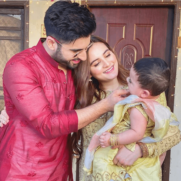 Here’s How Pakistani Celebrities Are Celebrating Eid This Eid-ul-Fitr isn’t the same. With the tragedy, loss, and the pandemic surrounding us this year, the festivities aren’t just what they used to be. Every year, we hook ourselves to our favorite celebrities Instagram and Twitter accounts to see what they wore, how they dressed up, and what they are doing at the moment. However, the celebrations aren’t the same this year. More than half the celebrities did not share their Eid festivities over social media to honor the ones we have lost. The other half were wise in their posts telling people to enjoy Eid while staying safe, keeping the lost one in prayers, and staying at home. If you are still rooting for how Pakistani celebrities are celebrating Eid, here is our round-up from their social media posts. Have a look: Let’s start with Gohar Mirza who made quite the right point we all should keep in mind before we go and judge others: With that in mind, let’s see what other celebrities are upto. Nida shared the picture of her family celebrating the Eid in Quarantine while they all have been diagnosed positive with CoVid. We wish them a speedy recovery: View this post on Instagram QUARANTINE PARTNERS.WE R FINE ALHUMDULLILAH.BUT TESTED POSITIVE .ISOLATED.OUR BOYS ARE FINE THEY ARE NEGATIVE.PLZ PRAY FOR US....EID MUBARAK A POST SHARED BY NIDA YASIR (@ITSNIDAYASIR.OFFICIAL) ON MAY 24, 2020 AT 4:22AM PDT Fahad Mustafa also shared a picture with his sons, and it is oh so cute! View this post on Instagram EID MUBARAK ♥️ A POST SHARED BY FAHAD MUSTAFA (@MUSTAFAFAHAD26) ON MAY 23, 2020 AT 9:53PM PDT Amna Babar is celebrating the first Eid with her beautiful daughter, and she is absolutely precious: View this post on Instagram BEFORE WE ASK FOR HAPPINESS AND PROSPERITY, WE SHOULD ASK FOR MERCY. MAY ALLAH SHOWER HIS MERCY ON US. EID MUBARAK. @FARAHANDFATIMA @PRINCESSANDTHECAKE A POST SHARED BY AMNA BABAR (@AMNABABER) ON MAY 25, 2020 AT 3:09AM PDT The star couple Aiman Khan and Muneeb butt are also celebrating first Eid with their beautiful baby girl: View this post on Instagram FIRST EID WITH AMAL ! #FAMILYISEVERYTHING #EIDMUBARAK A POST SHARED BY MUNEEB BUTT (@MUNEEB_BUTT) ON MAY 24, 2020 AT 8:12AM PDT Danish Taimoor and Ayeza, which are our favourite couple also shared their Eid picture and it is absolutely fresh and breath-taking. The complete Eid vibes! View this post on Instagram EID MUBARAK A POST SHARED BY DANISH TAIMOOR (@DANISHTAIMOOR16) ON MAY 25, 2020 AT 3:14AM PDT On the other hand, Anoushey Ashraf took some time off from the regular Eid celebration. With everything that’s going around she decided to spend her Eid in the mountains: View this post on Instagram SO MANY OF YOU HAVE ASKED ME FOR A FULL PICTURE OF MY EID OUTFIT. I WANTED IT SOMEWHERE BETWEEN SIMPLE, CLASSY, COMFY, PRETTY AND YET EASY TO CARRY OFF...YOU CAN DRESS IT UP AND DRESS IT DOWN AND THAT’S WHAT I LOVE ABOUT IT. WITH SO MUCH SADNESS AROUND US, PUTTING ON THIS OUTFIT AND MY CHAAND BALI’S TO SIT IN THE GARDEN AND JUST READ HAS BEEN UPLIFTING :) @NICKIENINAOFFICIAL HAVE ALWAYS DRESSED ME TO MY BEST. LOVE THEM LADIES AND THEIR EVERY CLASSY DESIGNS. #EIDMUBARAK #NICKIENINA AND YEAH, MY COMFY SLIP ONS ARE BY @LILYCO.PK ❤️ A POST SHARED BY ANOUSHEY ASHRAF (@ANOUSHEYASHRAF) ON MAY 25, 2020 AT 2:17AM PDT These were just some of our favorite celebrities who shared how they are celebrating their Eid. On the other hand, many of these including the cricketer Amir, Wasim Akram, Shaneira Akram and Imran Abbas shared how they were feeling lonely and depressed this Eid and could not celebrate because of the circumstances around. With this note, Eid Mubarak from our end too.