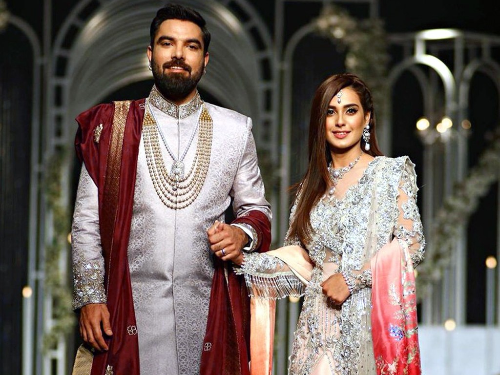Do You Know The Story Of How Iqra Aziz & Yasir Hussain Fell In Love? Iqra Aziz and Yasir Hussain are the IT couple of the town. Even though they have been married for quite some time, people still root for how they are, what they do, and how they got together. This couple is anything but shy about how they met and what their story is. This is why they have been vocal about it on social media and various Television shows as well. Recently, they were invited to a show where both of them shared their love story and it is screaming couple goals at us. Iqra revealed that they were accustomed to meeting each other at award shows in Canada:  “We used to meet at award shows but when we met in Canada for an award show there, we had a lot of time and we hung out and spent time together.” What’s to come next is even more exciting. Yasir fell in love with Iqra in their first meeting and decided to tell her the same. She confessed to Iqra about his love for her and wanted to make it official. He approached her mother for the proposal and to make the marriage happen: “Then I talked to Iqra’s mother and she took some time but then she agreed. I wanted to get married rather than wasting time.” The couple also went on to discuss their family plans with the host. “We both like children but we are not planning kids anytime soon as I think Iqra needs to focus on her career. When your career is flourishing, this is an extra responsibility.” Both of them shared that patience has been the key to a successful married life. They are enjoying their life together and love sharing beautiful memories. The couple tied the knot back on December 28, 2019, in a private wedding ceremony only with close friends and family. They both look super cute together and we root for them to come on-screen. We wish the couple all the love and happiness in the world.