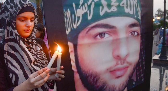 Burhan Wani - The fourth martyrdom anniversary of Kashmiri youth leader Burhan Muzaffar Wani is being observed on Wednesday to pay glowing tribute to the young martyr and reiterate the pledge to continue the struggle for Kashmiris’ right to self-determination. The 22-year-old top Hizbul Mujahideen Commander Burhan Wani was martyred along with his two associates on July 8, 2016 in Kokernag area of Indian Occupied Kashmir’s Anantnag district. His death triggered massive anti-India and pro-freedom protests across the Indian Occupied Jammu and Kashmir (IOJ&K) and reinvigorated the just struggle for Kashmir’s freedom. To mark the fourth martyrdom anniversary of Burhan Wani, a complete shutdown is being observed in IOJ&K today on the call of the veteran Hurriyat leader Syed Ali Gilani and the All Parties Hurriyat Conference (APHC). The objective of the strike is to convey a message to the world community particularly the United Nations that the people of Jammu and Kashmir completely reject the forcible occupation of their motherland by India. As per the APHC Spokesman, July 8 is being observed as Youm--e-Istiqlal [Freedom Day] to reiterate the Kashmiris' resolve that they would continue their struggle for right to self-determination through thick and thin. Meanwhile, to mark the martyrdom anniversary of Burhan Wani, protest demonstrations are being across Azad Kashmir to pay tributes to the martyrs and to draw world attention towards massive human rights violation by Indian troops in Occupied Kashmir. The Kashmir Liberation Cell, Pasban-e-Hurriyat and other social and political organizations have arranged protest rallies and demonstrations in all big and small cities and towns of the state. In Muzaffarabad, main protest gathering is being held at Burhan Muzaffar Wani Chowk. A rally is also being taken out by Pasban-e-Hurriyat in Muzaffarabad.