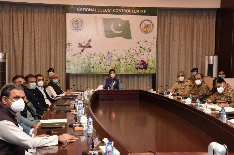 Locust Control - Prime Minister Imran Khan has said that the federal government will undertake every possible effort for locust control since it involves the food security of the Country. While speaking at a briefing on the National Action Plan for Locust Control at the National Locust Control Center in Islamabad on Friday, the prime minister accorded in-principle approval for Phase-II of the National Action Plan for Locust Control. It was also decided that the affected farmers would also be compensated through this package. The prime minister highly appreciated timely and coordinated response of federal and provincial governments including Pakistan army for effectively controlling locust attack and use of indigenously developed equipment. Imran Khan emphasized that a coordinated national response of federal and provincial governments and organisations is required to cope with the expected locust swarm so that crop production is not affected. The prime minister said that the locust attack combined with COVID-19 pandemic was a huge challenge for Pakistan. The prime minister was informed that the National Action Plan for Locust Control Phase-I has been completed. 