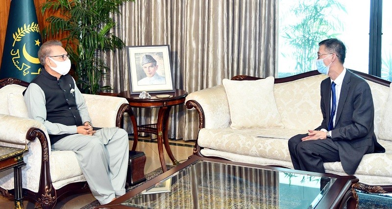 CPEC - President Dr. Arif Alvi has said that India is creating trouble on China Pakistan Economic Corridor (CPEC) and its belligerent attitude poses a threat to regional peace and stability. While talking to Chinese Ambassador Yao Jing who called on him at Aiwan-e-Sadr in Islamabad on Thursday, the president said that Pakistan highly valued its relationship with China which had always stood by Pakistan at difficult times. The president assured that Pakistan would continue to support One-China Policy and stand by China on core issues of national interest including Hong Kong, Tibet, and Taiwan. The Chinese ambassador thanked the government of Pakistan for supporting his country’s stance on Hong Kong and other issues of national interests. Yao Jing said that the Chinese leadership and people appreciated the role of President Alvi in promoting Pak-China relations and his support to China during the COVID-19 crisis. The ambassador also delivered a message of felicitation from the Chinese President Xi Jinping on his forthcoming birthday. President Arif Alvi emphasized that both Pakistan and China need to further enhance cooperation in the areas of information technology, economy, and defense. The meeting stressed the need to further deepen and expand strategic cooperation in view of the emerging regional environment. It was agreed to work together for the promotion of regional peace and stability. The president expressed his gratitude to China for her support during Coronavirus pandemic as well as in the United Nations Security Council against India’s illegal unilateral steps in India Occupied Jammu and Kashmir (IOJ&K).