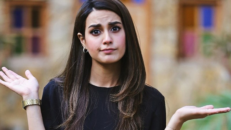 Will Iqra Aziz Be Making A Film Debut? If the title stopped you in the mid-tracks, it did us as well. But, before we go into the details further, let me say that it can be mere speculation from the Netizens because that’s what we are good at. However, there is something new definitely cooking and we are not sure what’s that. But we are here to find that out together, so if you have a bit of an idea on what Iqra Aziz is up to, we are all ears. This little actress has conquered the Pakistani entertainment industry with her acting skills, and we have yet to see what else she has in store for us. Now you might wonder, what happened that led me to think of Iqra switching careers? Let’s discuss that together: Is Iqra Really Leaving Acting? Now that might be a bit of overdone news, but this time, she is doing something new. In her recent Instagram post, she hinted at either a possible new venture or a new responsibility she has taken over for something exciting coming soon. She posted a video where she was skimming pages, writing, and redoing something quickly. Iqra was intently focused on her working, quickly scribbling something one after the other. Alongside the video, she put up the caption as: “Did something new, it’s so interesting and exciting. Now waiting for you all to watch it♥️🥰👍🏻 #bismillah #preparing” Here is the video she posted alongside: What Can She Be Focusing On? Although we have no idea, as no other announcement other than this Insta post has been made yet, but many people have been speculating her making a debut in the script-writing world. She has been tremendous with her acting gigs, taking projects different than the other one after another. We have seen her bubbly, serious, furious, and funny. We have seen her almost acting in all the possible genres of the Pakistani entertainment industry. Hence, it does not sound like a far-fetched idea that she might be involved in putting together a few words for a script. By the looks of the video, we can guess that whatever she is doing has to do with a lot of writing. Is Iqra Making A Film Debut? Now, there is another wild guess. It can just be that she has signed her first film project and is working on reading the script and pointing out the parts that need to be changed or discussed. Since we haven’t seen her on the big screen either even though rumors of her appearing with the husband Yasir Hussain in Half Fry are ripe. Now, these were just our guesses and what the netizens are talking about. We are impatiently waiting to see what Iqra has in store for us, and we will possibly get to know about that once she is back from the vacations. 