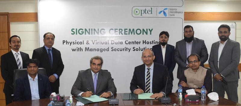Telenor Microfinance Bank - Pakistan Telecommunication Company Limited (PTCL) and Telenor Microfinance Bank Limited have signed an agreement for provision of physical and Virtual Data Center (VDC) Hosting Services bundled with industry’s leading Managed Security solution. Zarrar Hasham Khan, Chief Business Services Officer, PTCL and Khurram Gul Agha, Chief Information Officer & Operations Support, Telenor Microfinance Bank, signed the agreement at a special ceremony recently held at PTCL Zonal office in Karachi. Umar Farooqi, General Manager, Digital Services Sales, PTCL, Javaid Sher Ali, Executive Director, IT Planning & Architecture, Telenor Microfinance Bank and Nadeem Ashfaq, Director Information Technology, Telenor Microfinance Bank, were also present on the occasion, along with other senior officials. PTCL is providing Telenor Microfinance Bank with its state-of-the-art infrastructure and platform solutions that are equipped with latest technology, managed security and DDoS filtering solution. During the signing ceremony, Zarrar Hasham Khan, Chief Business Services Officer, PTCL, said, “We are pleased to sign an agreement with Telenor Microfinance Bank to support them in fulfilling their business needs. PTCL, being a national company, is leading the digitization effort across the country to support the Prime Minister’s vision of a Digital Pakistan. Through such partnerships, PTCL continues to play its key role in the development of telecom infrastructure by providing innovative and secure solutions to the corporate sector that will further contribute towards the overall economic growth of the country.” On the occasion, Khurram Gul Agha, Chief Information Officer, Telenor Microfinance Bank, said, “In light of the current fast-paced banking activities specially through mobile and online platforms, regular upgrades to the security apparatus are crucial. We are pleased to sign this agreement with PTCL as our trusted partner for our Virtual Data Centers. Keeping our data secure is of utmost significance and we believe in providing our customers the best financial solutions which can provide them with the peace of mind required to fully embrace a digitally enabled financial lifestyle. This partnership with PTCL is a step in the right direction given the scale and quality of services that we offer.” PTCL endeavours to provide best-in-class services to its corporate customers across various industries in Pakistan. This agreement is part of the growth momentum in the diverse areas of ICT and Security Solutions, which is key to a digital banking eco-system in Pakistan.