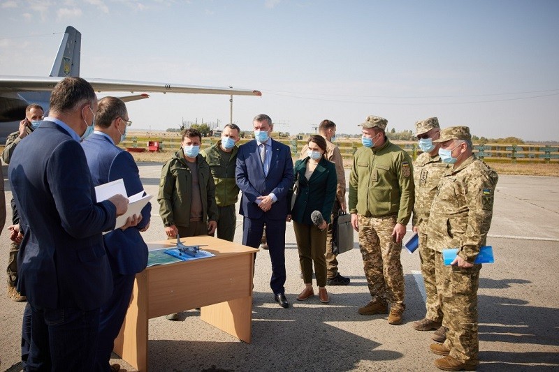 An-26 aircraft - The Ukrainian President Volodymyr Zelensky visited the Country’s northeastern Kharkiv region on Saturday to honor the memory of the victims of plane crash. On Friday night, An-26 aircraft with 20 Cadets and seven Officers from the Kharkiv Air Force University on board crashed in Kharkiv region, resulting in deaths of 26 people. "Mourning has been announced over the tragedy that occurred yesterday in the Kharkiv region. Four takeoffs and, unfortunately, three landings. Tragic statistics, which, unfortunately, led to the death of both cadets and crew," President Volodymyr Zelensky said according to his Office. President Volodymyr Zelenskyy noted that the crash killed young men from the 2nd to the 4th year of study and members of the plane's crew. In the crash, only two people onboard the ill-fated aircraft had survived but received serious wounds. However, later one of them died. "We had information that two boys survived. One - of medium severity. The second - doctors fought for him, but, unfortunately, in the morning we were told that he had died. My condolences to family and friends," Volodymyr Zelensky said. Immediately after the tragedy, the president held talks with Prime Minister Denys Shmyhal for the formation of a Commission to investigate the plane crash. The Commission included Representatives of the Ministry of Defense, the Ministry of Internal Affairs, the Prosecutor General's Office, and the State Bureau of Investigation. President Volodymyr Zelenskyy wants to receive information from relevant experts on the composition and technical condition of all military equipment in service in Ukraine. "We want to see complete statistics of all our equipment," the president said. Meanwhile, President of the Republic of Poland Andrzej Duda, Prime Minister of Canada Justin Trudeau, High Representative of the European Union for Foreign Affairs and Security Policy Josep Borrell, the Foreign Ministers of Poland, Albania, Bulgaria, Turkey, Sweden, Latvia and Moldova expressed their condolences with Ukraine over the An-26 aircraft crash.