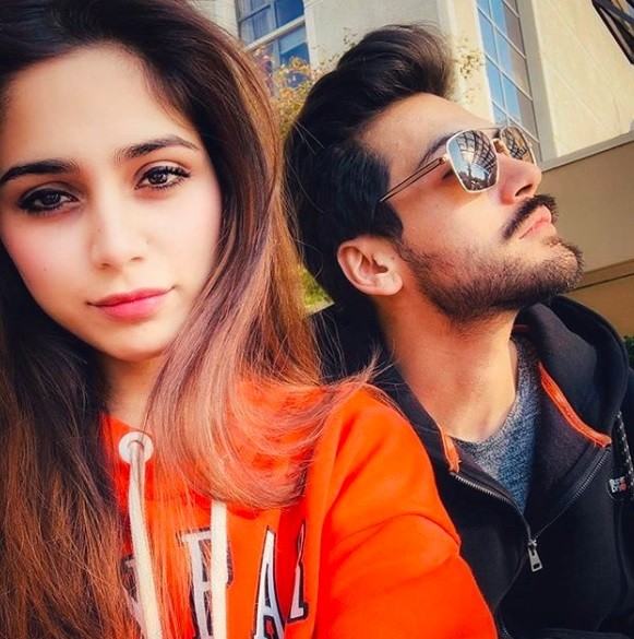 Aima Baig is one of the most talented singers who has gained fame in very little time. Her soulful voice grabs everyone's attention within a few seconds. Aima's most famous songs include Malang and Baazi from the big platform of Coke Studio. Aima always stays active on social media and that's the reason she has got a huge fan following. She is in an open relationship with actor Shahbaz Shigri. We came across an interesting interview of this duo on social media and we bet that it is worth watching. Check out further details and watch this interesting interview! Aima Baig & Shahbaz Have Got Something Interesting to do! Although Aima and Shahbaz have appeared in many interviews together, however, this one has a lot of interesting stuff that instantly grabbed our attention. The interviewer gave them a list of challenges and this session turned out as a package of entertainment. Watch this video first! Have you ever wondered seeing Aima Baig going for a prank call to any celebrity? We have it here in this video and a lot more than you are expecting. Check out the questions and activities Aima Baig and Shahbaz Shigri were asked to do. Prank Call A Celebrity Friend   The couple enjoyed this session to the fullest with all in laughter. They decided to call Hania Amir who is Aima Baig's best friend. The call turned out so much entertaining when Hania also called them while pranking back.  Fitting in The Gummy Bears in Your Mouth The next challenge was to fit in as many gummy bears in their mouths as they can. The couple started stuffing their mouths and the result is what you have just watched in the video! Arm Wrestle Each Other That was one of the best challenges! Aima and Shahbaz had great fun during this arm wrestle session. Shahbaz won the first round easily while the second round stood Aima Baig as the winner. The third round once again marked the victory of Shahbaz Shigri. Draw Each Other This drawing activity brought the childhood memories back as Aima and Shahbaz sketched each other. What do you think who did the best job? Plank For A Minute The Aima-Shahbaz duo went down to plank for a minute and they found it the hardest thing to try among all the activities. However, they enjoyed every moment out of this interview together.  So, what do you think about this fun package by Aima Baig and Shahbaz Shigri? Share your valuable feedback with us!