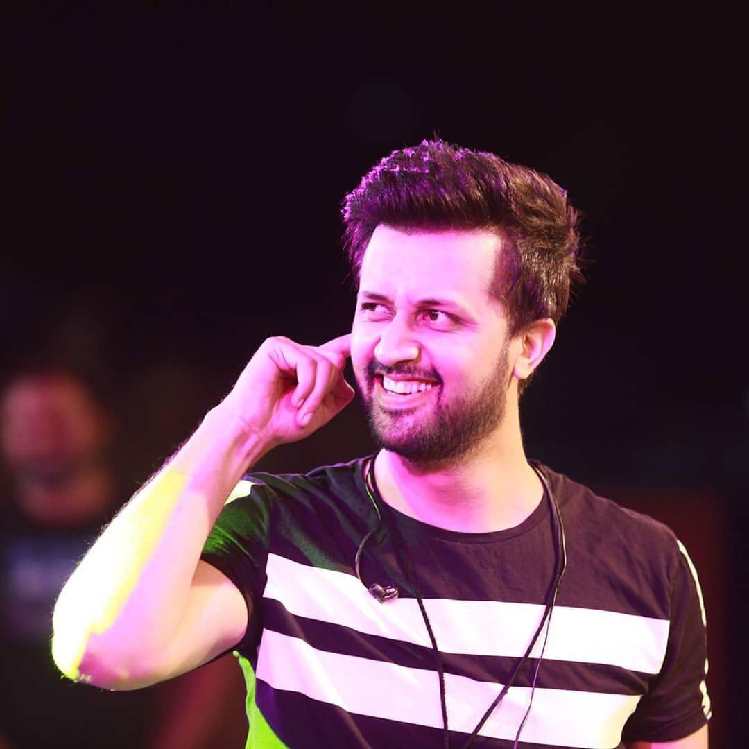 Have you ever thought of listening about something funny from the legendary singer Atif Aslam? Well... he seems to be a serious and lesser talkative personality. However, we came across a video on social media in which Atif recalled a hilarious incident from the past and fans are all loving it. We bet you that it is a perfect laughter dose. So, here we have got the video for all of you to share what the incident was all about and how it turned on laughter for fans. Atif Aslam Recalls A Funny Incident From The Past - Video! Think about the time when Atif Aslam was just any of the young boys who are passionate about singing and music. That age is basically the time when a person keeps on switching between interests and explores different things. However, Atif was a born-talent and he proved it right at every step and at all platforms he performed. Atif focussed on his passion and opted to take music to the next level by making a career in the field. No one ever had any idea that he will be gaining fame as a singer in Pakistan and even across the borders. So, recalling that time when Atif newly got famous, he told that he was going to a concert that was taking place in Alhamra, Lahore. There was a huge crowd inside waiting for him and here is what happened when he reached there. Watch this video! It was definitely something amazing and we are all in laughter knowing about how the guard failed to recognize Atif. However, today everyone knows him the best and loves to listen to his soulful songs.  So, what do you think about this incident Atif Aslam recalled? Which one of Atif's songs do you like the most? Do share your feedback with us and until then, enjoy this song!