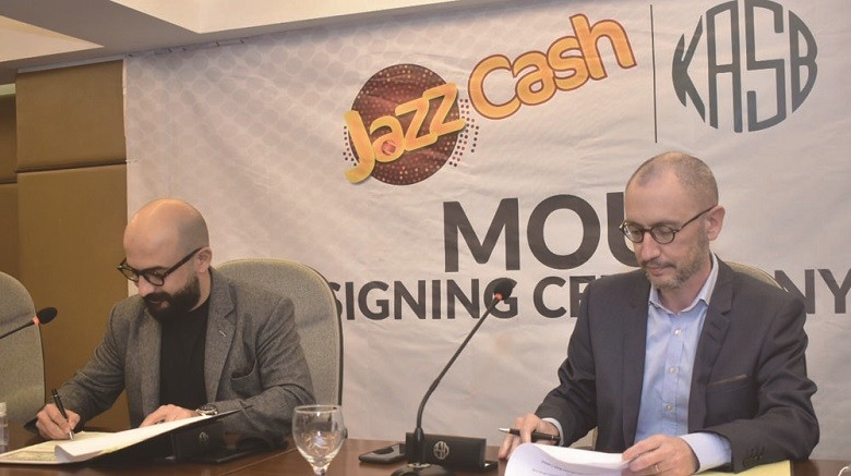 JazzCash, Pakistan's leading digital payments platform, and KASB Securities, the Country’s leading brokerage firm, have signed a Memorandum of Understanding (MoU) to promote retail investment by easing access to investment products and stock market trading. The MoU was signed by the CEO JazzCash Erwan Gelebart and the Chairman KASB Securities Ali Farid Khwaja during a ceremony at the Pakistan Stock Exchange (PSX) in Karachi on Tuesday. As per the MoU, KASB Securities will assist JazzCash in offering its customers investment access to stocks, exchange traded funds, gold, government bonds and mutual funds. JazzCash will also work towards integrating KASB Securities’ popular investment application, KTrade, and KASB Varsity, a financial education platform. These new services will be available to JazzCash customers through its app in the second quarter of this year. This unique collaboration aims to increase financial inclusion and the retail investor base, as currently less than 0.1% of the population has invested in stocks and mutual funds with very limited access to investment products and financial education. Speaking about the initiative, the CEO JazzCash Erwan Gelebart said, “With more than 12 million monthly active users, JazzCash has played a pivotal role in providing safe, reliable and convenient financial services to the masses. By leveraging our technology and a customer-centric approach coupled with KASB Securities’ market expertise, now we are aiming to enable millions of people to start trading to help foster a culture of investment in Pakistan.” According to the Chairman KASB Securities Ali Farid Khwaja, “At KASB, our mission is to bring the best investment products, market access and information to the citizens. Until now this access has been limited to only large institutions and high net worth investors. We think our partnership with JazzCash will deepen financial penetration and help Pakistanis make better financial decisions. We believe this is a major milestone for the Country’s capital markets’ development.”