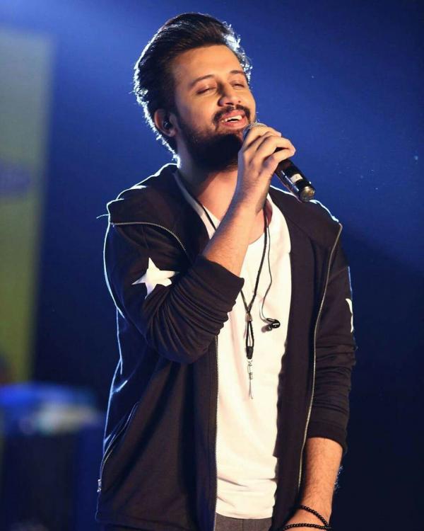 The legendary singer and heartthrob Atif Aslam has opened up for the first time in a way that he never did before. Until today, we have seen him entertaining his fans with his soulful voice and made way directly to our hearts with the best compositions. However, people rarely know about the personal life of Atif. No one ever had an idea that the soulful singer who is all in smiles every time we see him on the screen or in concerts, is the one who had a lonely childhood. So, here we have got details about the things Atif Aslam opened up about during the interview. Check out these details!  Atif Aslam Opens Up about Troubled Childhood, Depression & Marriage!  Atif Aslam has broken his silence over his past days specifically starting from talking about having a lonely childhood. Speaking to Anas Bukhash on his show AB Talks, Atif:  “I’M THE YOUNGEST AMONGST MY SIBLINGS. MY STUBBORNNESS COMES FROM THERE.”  He went on to say:  “WHEN I WAS A KID, I NEVER BONDED WITH MY SIBLINGS BECAUSE OF A DRASTIC AGE DIFFERENCE. I AM THE YOUNGEST, AND GOT BEAT[EN]-UP THE MOST.”  The legendary singer further added:  “I HAVE ALWAYS BEEN A NAÏVE, SENSITIVE KID WHO WOULD DISCONNECT WITH THE WORLD IF I WAS NOT FEELING RIGHT OR IN THE CORRECT HEAD-SPACE. I GUESS BECAUSE OF MY PERSONALITY BEING SO DISRUPTIVE, I NEVER MADE GREAT FRIENDS AND WENT THROUGH A LONELY PATCH AT THAT TIME.”  Atif also explained that the strict environment in his house restricted him from being open with his parents. He stated:  “AS A CHILD, I HAVE NEVER BEEN EXPRESSIVE BECAUSE IN MY HOUSEHOLD WE NEVER HUGGED OR CUDDLED EACH OTHER,” SHARED ASLAM. “I KNEW THEY [PARENTS] LOVED ME AND I LOVED THEM BACK BUT TO BE AFFECTIONATE TOWARDS THEM WAS OUT OF THE BOX, MAYBE BECAUSE I WAS TOO SCARED OF AN AGGRESSIVE REACTION.”  Atif’s Interests and Career Choices  While taking the conversation further on his childhood, Atif also revealed he wanted to become a cricketer. However, later he gave up because his parents were not satisfied with it.  “I WORKED REALLY HARD AT IT BUT MY PARENTS TOOK IT AS A HOBBY AND DIDN’T KNOW HOW GOOD I WAS. THAT LED TO ME GIVING UP ON CRICKET AS I WAS SKIPPING CLASSES,” SHARED ASLAM.  He spilt the beans on his journey into the field of music and confessed that:  “I THINK I EXPLORED MYSELF IN THAT. I DID NOT HAVE ANY SORT OF AN OUTLET AND WAS IN DIRE NEED OF ONE. I BECAME QUIET AND LONELY.”  Atif added that listening to Nusrat Fateh Ali Khan (NFAK) changed his interest and helped him cope.  “ABOUT 23 YEARS AGO, MY BROTHER INTRODUCED ME TO NFAK. WHILE I FELT ALONE AND AT MY WORST, HIS [NFAK] MUSIC CALMED ME, BROUGHT ME CLOSER TO GOD AND WHEN I STARTED PRAYING, I STARTED GETTING THE ANSWERS. DURING THAT TIME, I EXPLORED AND FOUND MY OWN VOICE.”  He further shared:  “I DIDN’T KNOW THAT THIS WOULD BECOME MY CAREER. IT ALL STARTED WHEN WE WERE SHIFTING, THE HOUSE WAS EMPTY AS THE NIGHT SKY PREVAILED AT ALMOST SIX IN THE EVENING. I STARTED SINGING, MY VOICE ECHOED THROUGH THE FOUR WALLS AND UPON REACHING THE HIGH-NOTES, I WAS SCARED OF MY OWN VOICE.”  During this friendly interview, he revealed more about his first song and told that he invested his own pocket money into recording for that one song he penned in his free time.  “I RECORDED MY FIRST SONG AADAT OUT OF MY POCKET MONEY. IT TOOK ME A FEW SECONDS TO UPLOAD IT ON THE INTERNET WHEN THERE WAS NOTHING LIKE WHATSAPP. PEOPLE STARTED LOVING IT AND LED TO THE MAKING OF A MUSIC VIDEO. THE RISE OF MY CAREER BEGAN AT THAT MOMENT.”  Atif Aslam’s Married Life  Atif Aslam talked about how balancing with married life is sometimes difficult. He expressed:  “IN FAME SOMETIMES, THINGS GET TRICKY MAKE YOU FEEL POWERFUL. YOU HAVE THE OPPORTUNITY TO TALK TO ANYBODY AROUND THE WORLD BUT IF YOU MISUSE THAT… IT’S SORT OF DIFFICULT TO LOOK IN THE MIRROR BECAUSE YOU KNOW YOU’VE GONE WRONG SOMEWHERE.”  While winding up the interview, Atif appreciated and praised his wife for standing by his side despite him being difficult at times.  Moreover, the ‘Aadat’ singer expressed his love for his fans, acknowledging how being a successful male singer leads to a women-centric fan base.  Here we have got the video of Atif’s latest song. Watch it now!     Want to add something to this write-up? Don’t forget to share your valuable feedback with us!