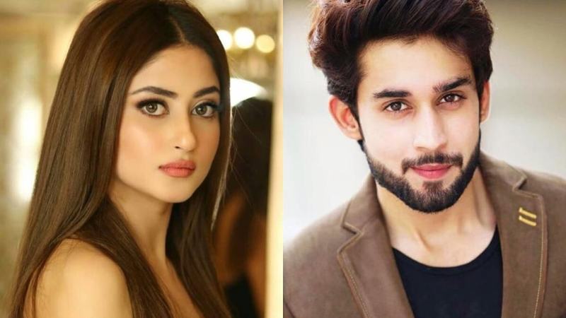 The super talented duo Sajal Aly and Bilal Abbas are all set to show up together once again but this time on the big screen. As soon as the news went viral on social media, the fans are so excited to welcome Sajal and Bilal with something new. So, here we have got all the details of the new project 'Khel Khel Mein.' Sajal Aly and Bilal Abbas To Reunite For 'Khel Khel Mein' The most favourite pair from the blockbuster drama serial O Rangreza, Sajal Aly and Bilal Abbas is back with a new project. The duo ruled over the hearts of the viewers with fantastic performances in the drama. Now, they’re both back to pair up for an upcoming film by Nabeel Qureshi ‘Khel Khel Mein’. About 'Khel Khel Mein' Sajal and Bilal took it to social media by posting pictures of the script of their upcoming film named 'Khel Khel Mein'. Sajal wrote with the picture 'Bismillah' while Bilal penned a heartwarming caption as: “WORKING WITH THE FINEST PRODUCER/DIRECTOR DUO IN THE COUNTRY FOR THE FIRST TIME. ISS BAAR MILTE HAIN THEATRE MEI.”  Khel Khel Mein will be directed by Nabeel Qureshi and produced by Fizza Ali Meerza, under ‘Filmwala Pictures’. They have also been working on ‘Fatman‘ featuring Ahmed Ali Butt and another web series on Lyari gang war.  The release date of the film is yet to be announced, however, the team is excited as much as their fans are looking forward to Khel Khel Mein. They have also received many congratulations and love from everyone around as soon as this news made its way to social media. Well... there is a lot to reveal and we are looking forward to more details.  So, what do you think about Sajal and Bilal as an on-screen couple and what are your expectations from Khel Khel Mein? Don't forget to share your valuable feedback with us!