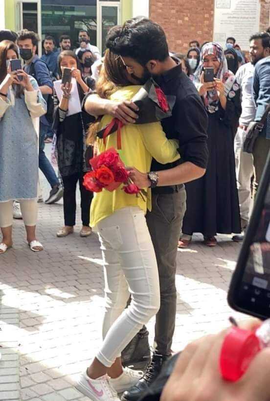 You might be wondering about what are the latest updates on the incident of the public proposal between the students of the University of Lahore that went viral on social media. Well… according to the latest updates, it seems that the UOL couple has finally tied the knot. Here we have got further details!  UOL Couple Public Proposal and Action!  Last week, a video clip of a girl going down on her knee with a bouquet in her hands to propose her beau took the Internet by storm. It spread like a wildfire over the internet, thus making it turn into the talk of the town. A clear divide of 50 per cent was observed on Twitter between the netizens who were in support and against this act. However, it was only a matter of time that the video reached the university administration, resulting in the expulsion of the two.  Reason Behind the Expulsion of the Couple!  In the video, it was something not only related to a public proposal merely but also had something that made netizens react outrageously. The girl while on her knees, says something to her beau, and the next thing we see is the couple in each other’s arms. The crowd was cheering and gushing over the lovebirds.  As soon as the video reached the UOL administration, they took stern action against the couple. The university on Friday released an official notice and made the decision to expel both the students from the university. Moreover, they banned them from entering the premises of the university.  Seems Like UOL Couple Just Got Married!  Although the couple Shehryar and Hadiqa earlier didn’t state anything in clear words about marriage, however, here we have something that got published in Daily Jang.  “THE COUPLE, WHO GOT ENGAGED IN PUBLIC AT LAHORE UNIVERSITY, GOT MARRIED WE DEMAND THE UNIVERSITY TO ADMIT BOTH OF THEM BACK. SHAME ON THOSE WHO WERE CALLING THE COUPLE’S MOVE OBSCENE. (DAILY JANG LAHORE).”  Right after it made its way to Twitter, the girl expressed her gratitude via her account while confirming the news.  Moreover, following Hadiqa, Shehryar also posted “Alhamdulillah” while expressing his thankfulness.  What do you think that the university management should now allow them to join again or there are still some hurdles for them to face? Don’t forget to share your valuable feedback with us!