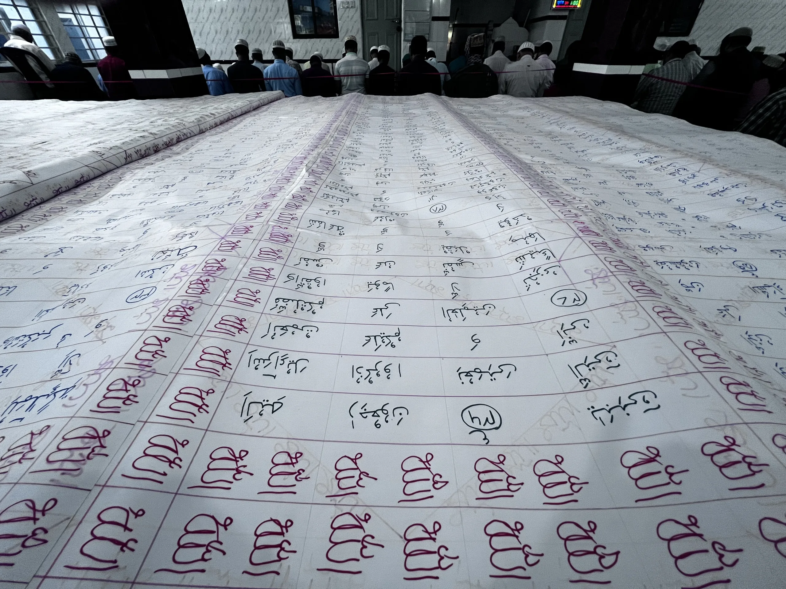 Remote Bangladeshi youth records by making world's biggest hand-written Quran